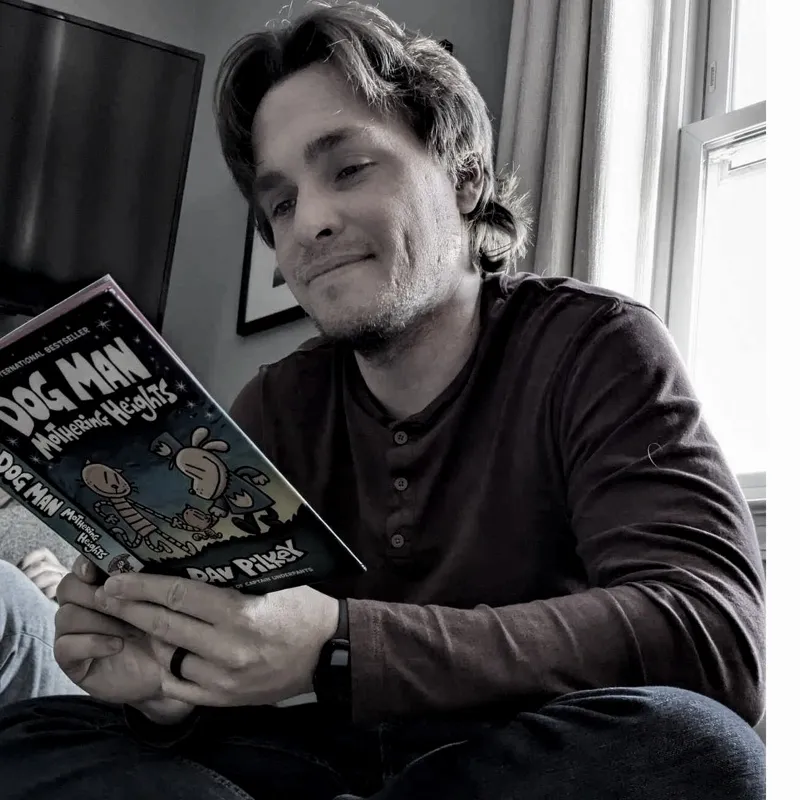 Dane reading a children's book
